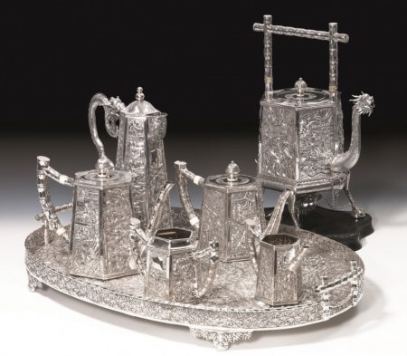Wang Hing silver 
repoussé tea set, seven pieces including tray; irst half of twentieth century